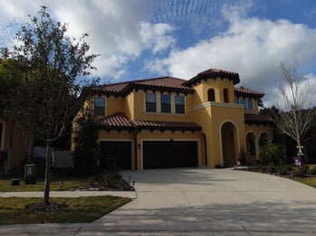 Yellow house to show exterior paint Tampa