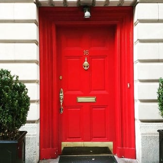 Red door pic showing how to paint a front door