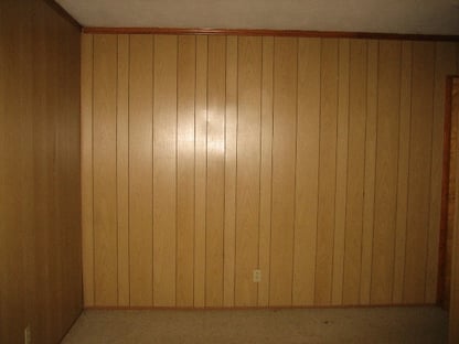 Unpainted walls to show painting paneling how-to