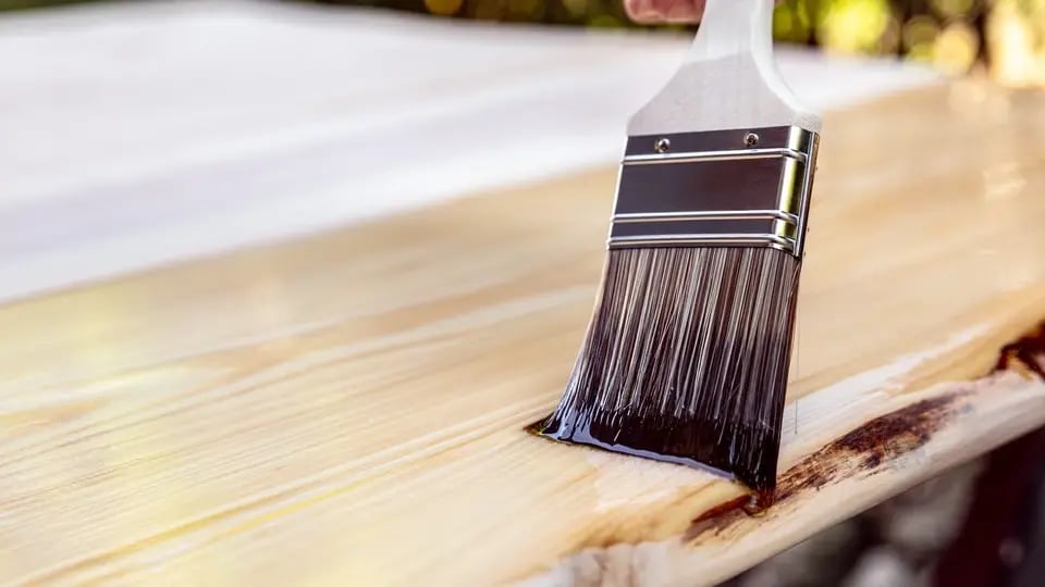 Painting-stained-wood-with-brush