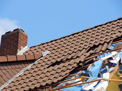 Tile roof in need of storm damage repair