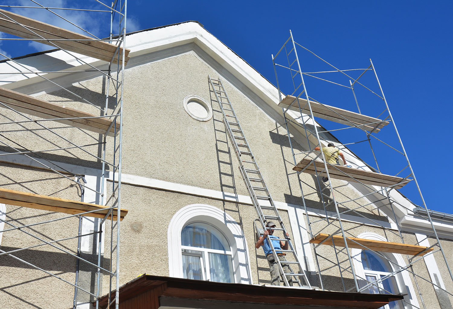 House painters working on a residential home